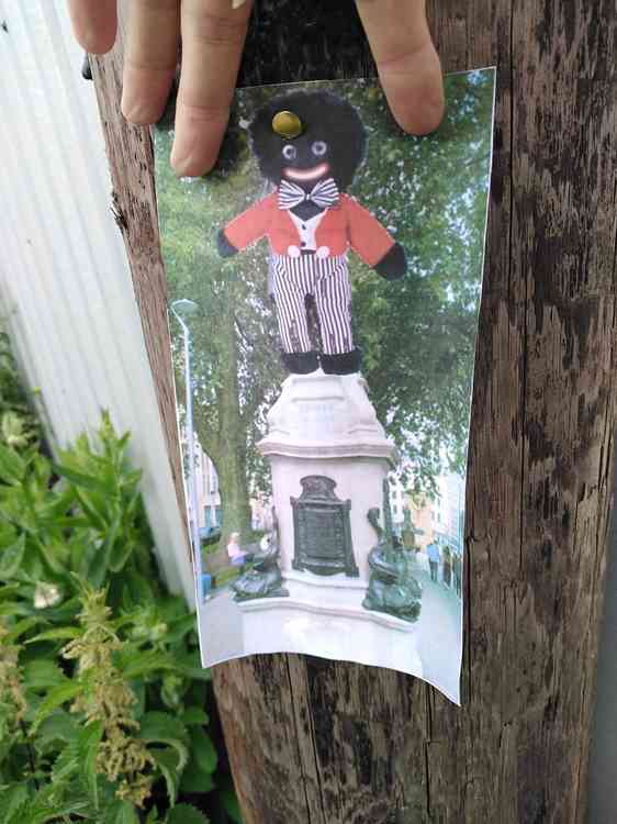 A golliwog poster pinned up in Pylle