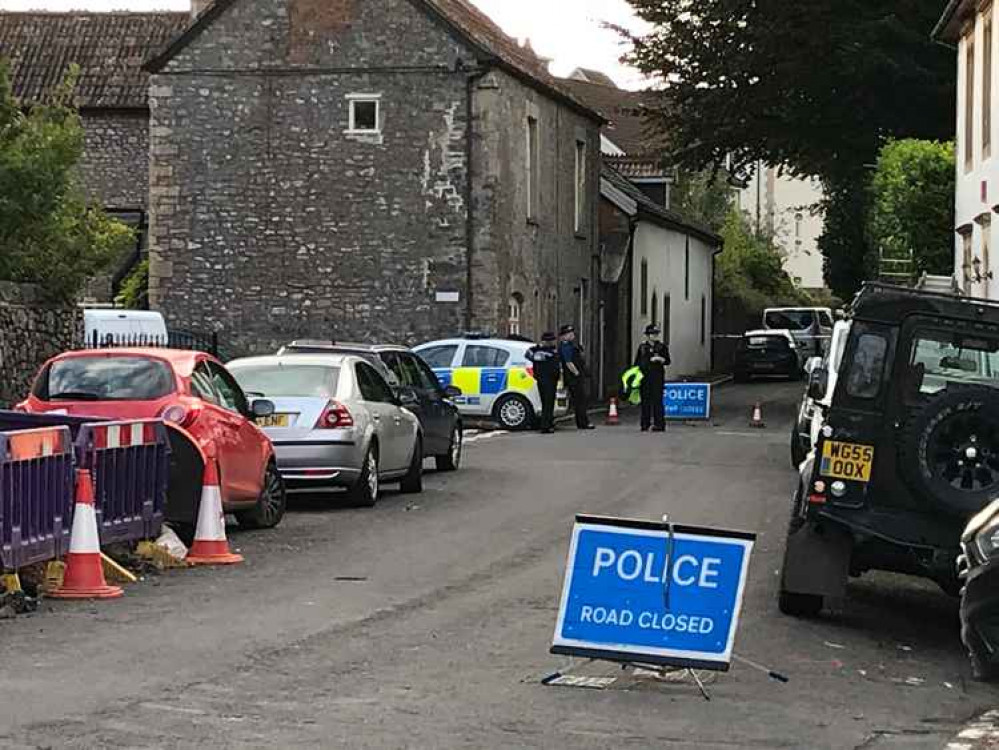 The police close off Oakhill High Street following the incident this afternoon