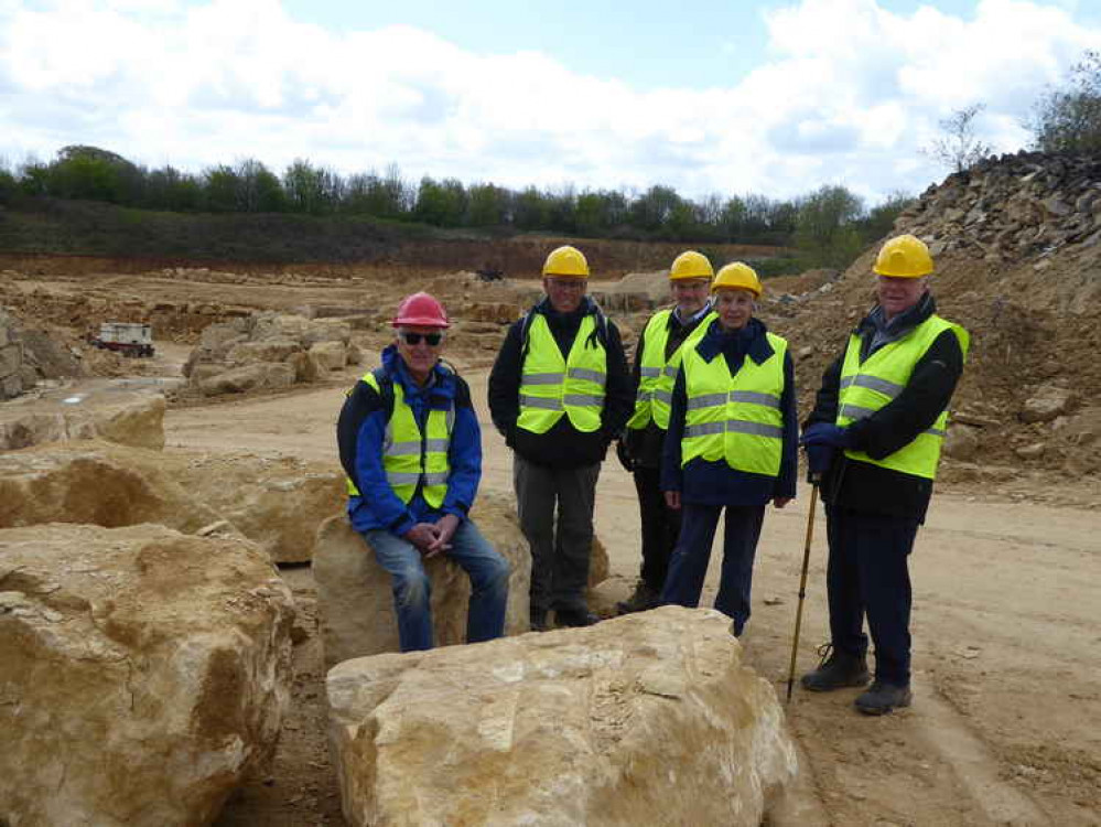 The Covid-secure group of six with Doulting stone blocks in the foreground, the quarry in the background and, just visible on the left hand side, the huge chain saw used to cut out some of the blocks