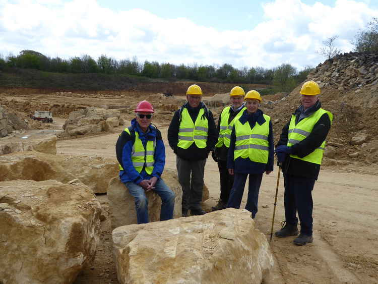 The Covid-secure group of six with Doulting stone blocks in the foreground, the quarry in the background and, just visible on the left hand side, the huge chain saw used to cut out some of the blocks