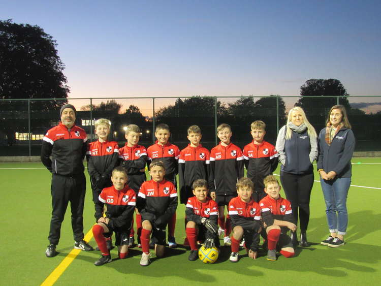 Coach Jeremy Watch with the Team Black U11 Team