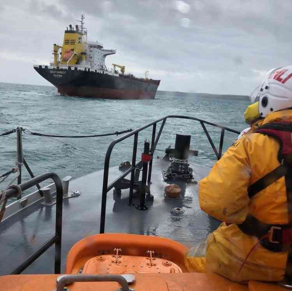 Image shows all-weather lifeboat Richard Cox Scott reaching the tanker