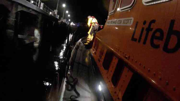 Falmouth all-weather lifeboat crew attending first shout in Falmouth harbour.