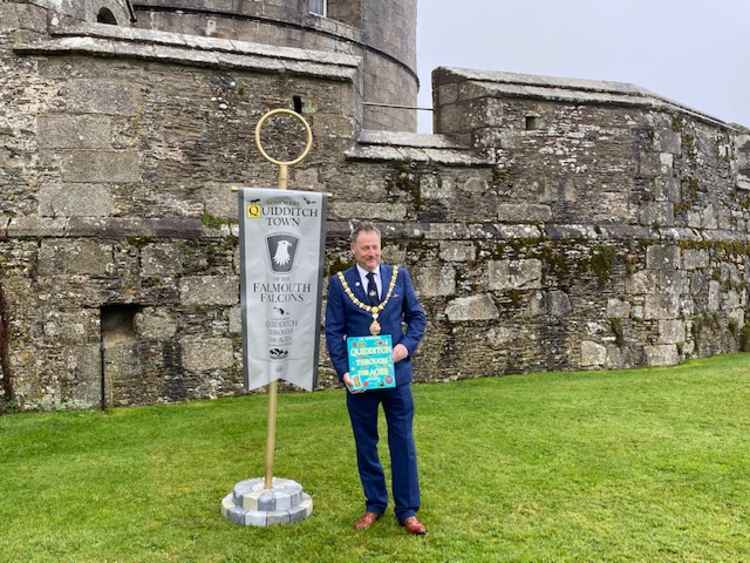 The Mayor of Falmouth, Councillor Steve Eva, accepts decorative banner in an official ceremony at Pendennis Castle