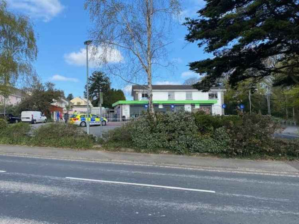 Police at the Co-op yesterday morning.