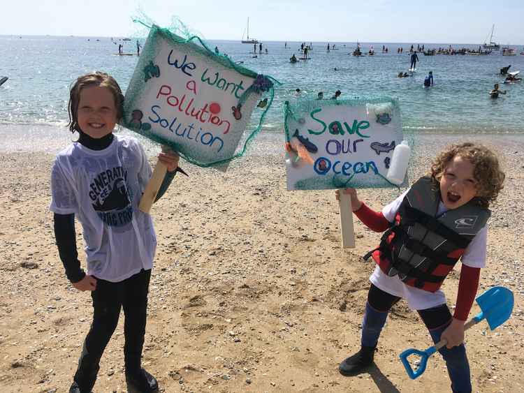 Two young supporters of the SAS mass paddleout at Gyllyngvase Beach, Falmouth (Image: Richard Whitehouse/LDRS).