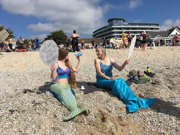 'Mermaids' at the SAS mass paddleout at Gyllyngvase Beach, Falmouth (Image: Richard Whitehouse/LDRS).