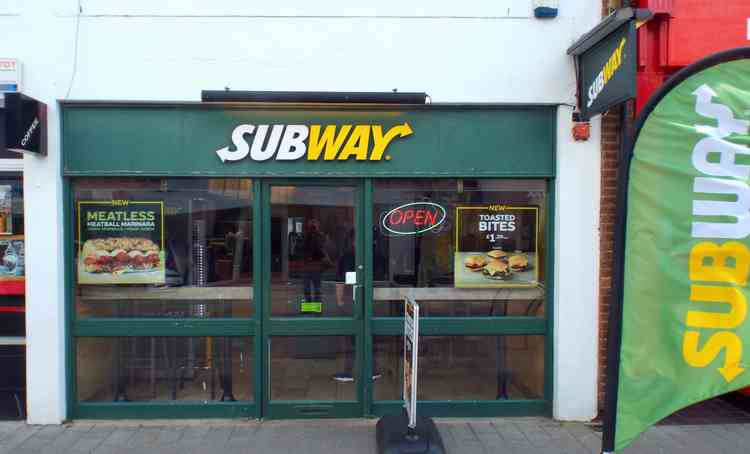 Customers at Subway keeping their distance