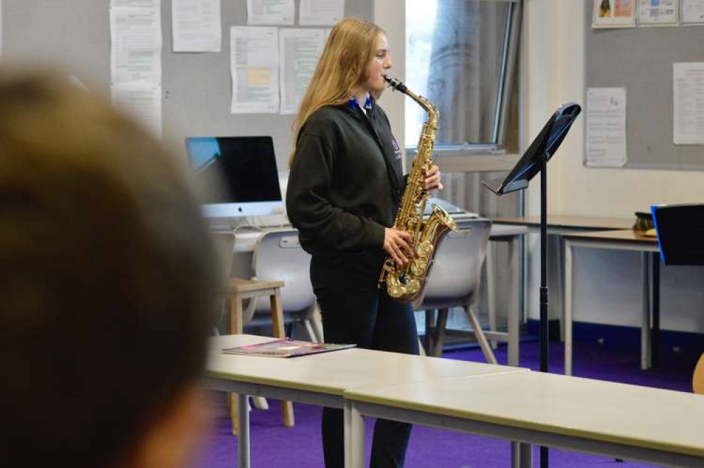 A Penryn College student playing saxophone.