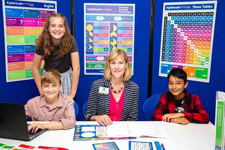 Centre Director Gemma Scott with two pupils