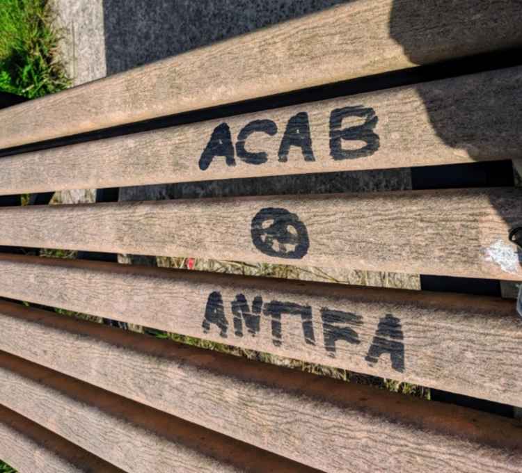 ACAB (meaning All Cops Are Bastards) was graffitied onto a Zig Zag bench in mid-2019 (Photo credit: Laura Seymour)