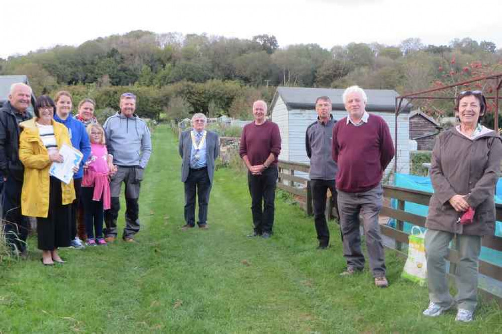 Caption Mr Marsh and family, Mr Bennet and councillors John Fanshaw, Andy Robertson, (chair of the committee) Anne Asbrey, Chris Franks.