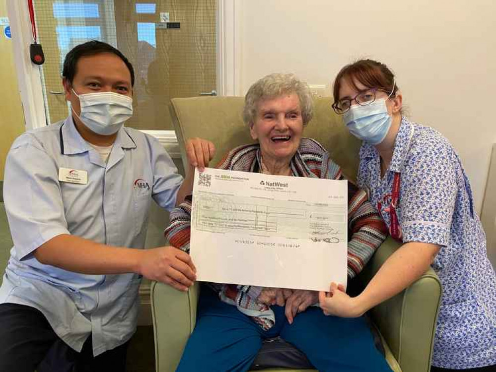 Resident Cynthia and staff members Steve and Maryanne looking very happy with the news.