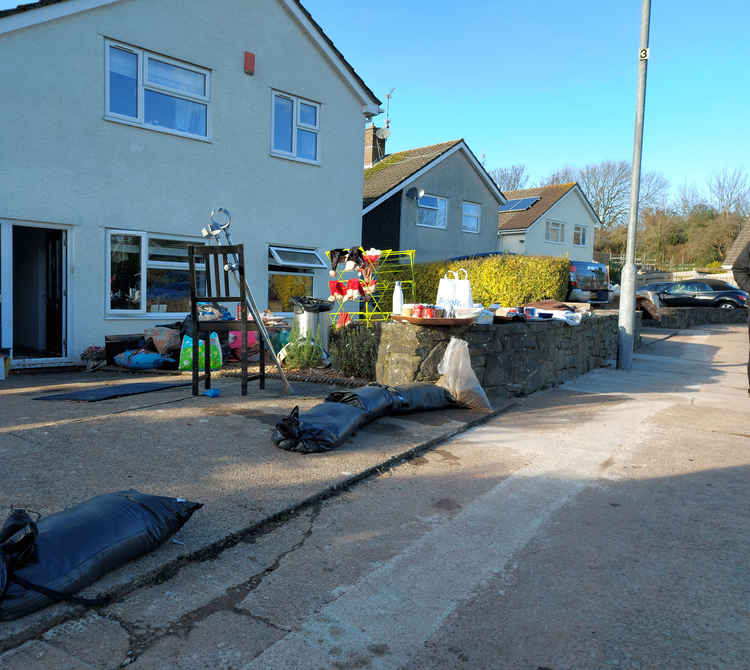 Sandbags have bee laid across driveways