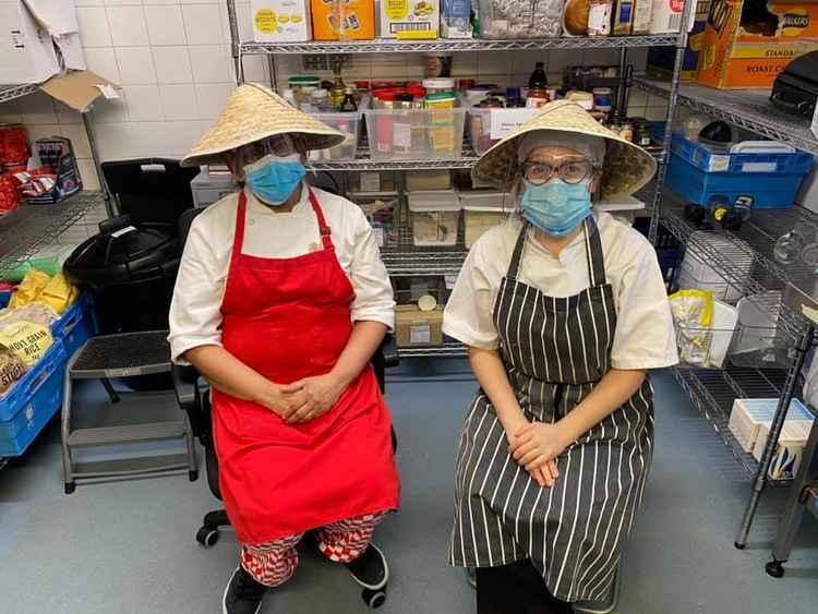 Chef Radica (red apron) & Nafisa, kitchen assistant