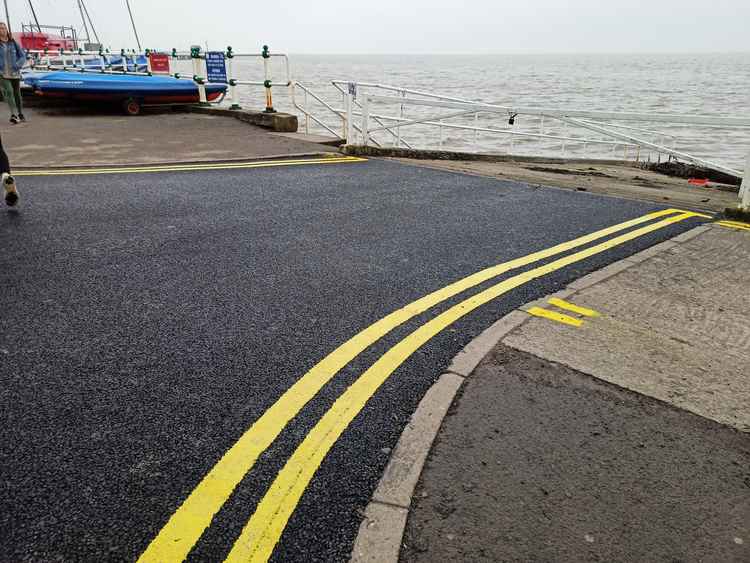 New lick of paint for lifeboat ramp. NEVER PARK HERE.