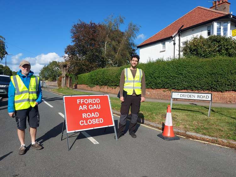 Volunteers on Dryden Road, which was closed to ease congestion outside Fairfield Primary School today