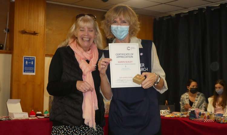 Karen Sealey receiving her 8 years award