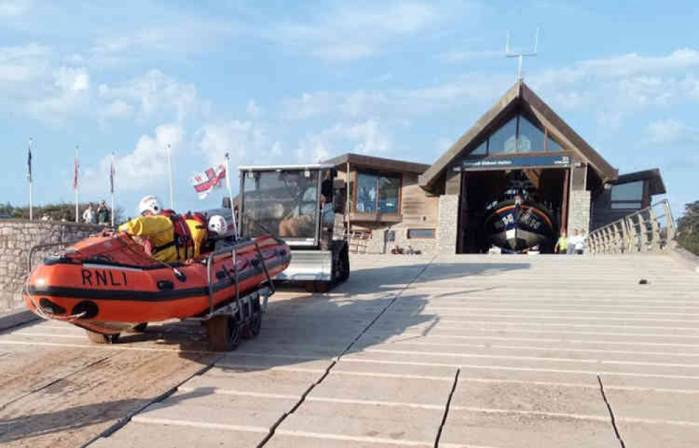 RNLI Inshore Lifeboat George Bearman II launches to the rescue.