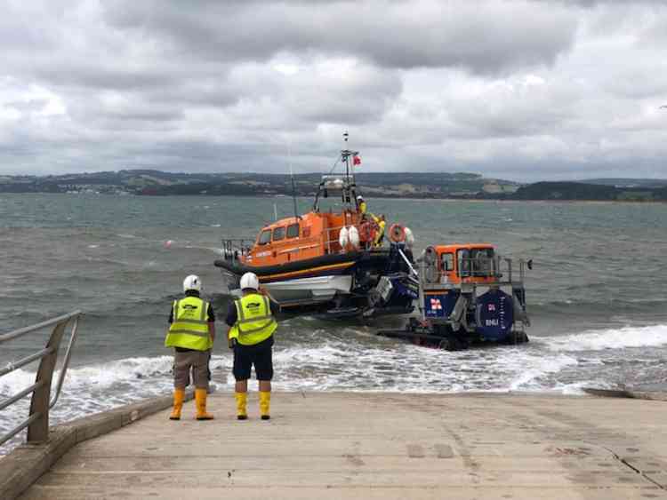 RNLI All Weather Lifeboat R & J Welburn launches to the rescue