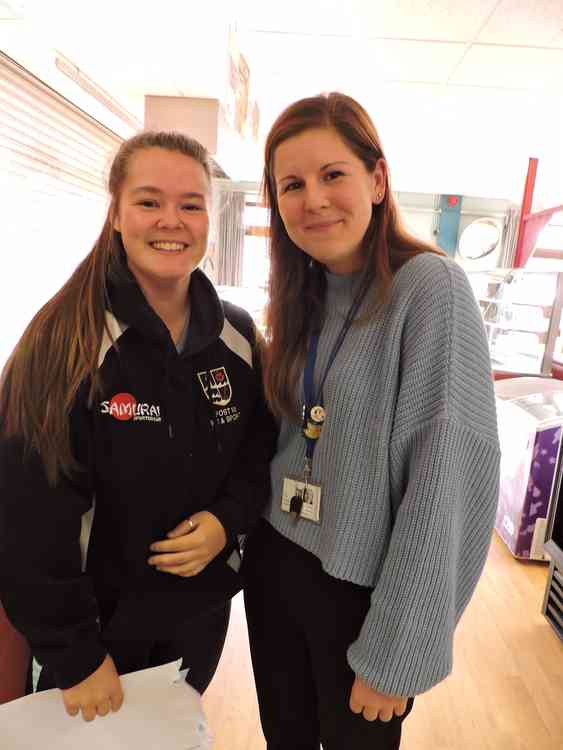 Exmouth Community College students celebrate after opening their results.