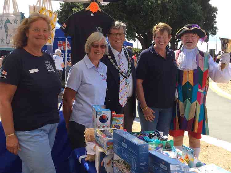 Town Mayor Steve Gazzard and Town Crier Roger Bourgein meet RNLI volunteers at the event