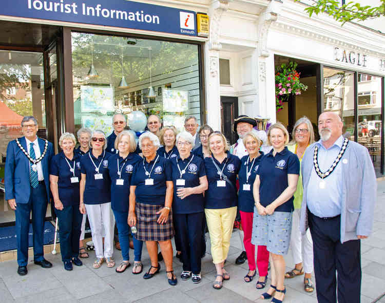 Tourist Information Service Staff flanked by (L) Steve Gazzard, Town Mayor and (R) Brian Bailey, Deputy Mayor. Credit : John Thorogood