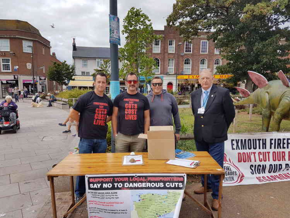 Councillor Fred Caygill (R) stood alongside firefighters petitioning the public in Exmouth.