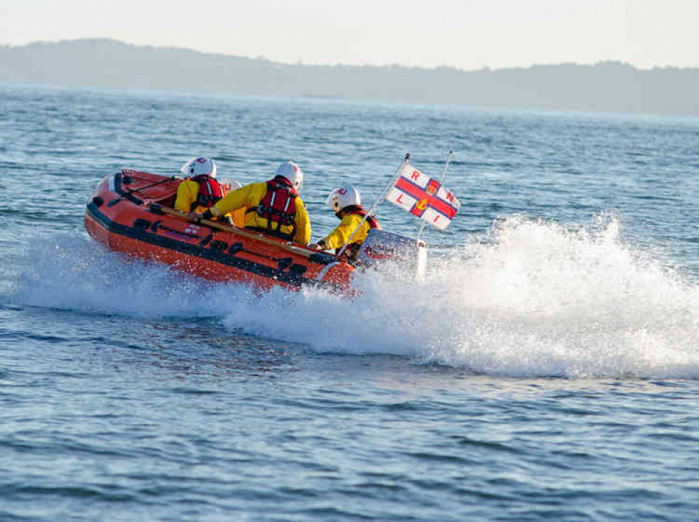 RNLI Inshore Lifeboat George Bearman II launches to the rescue.