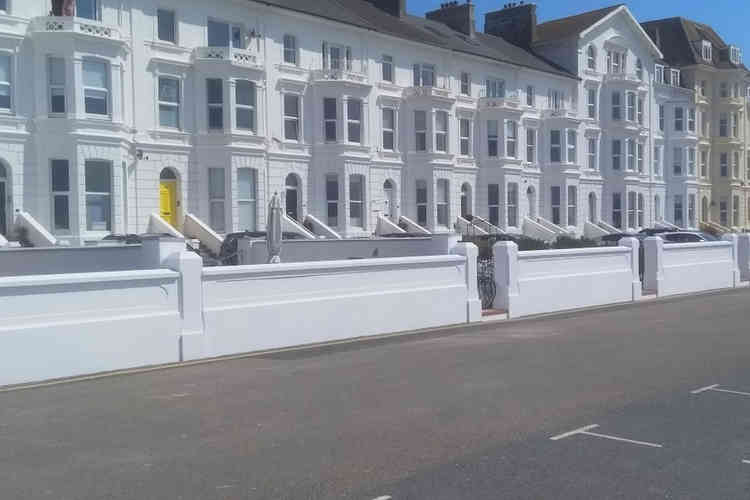The newly completed wall in front of seafront properties in Exmouth. Image courtesy of Gov.uk.