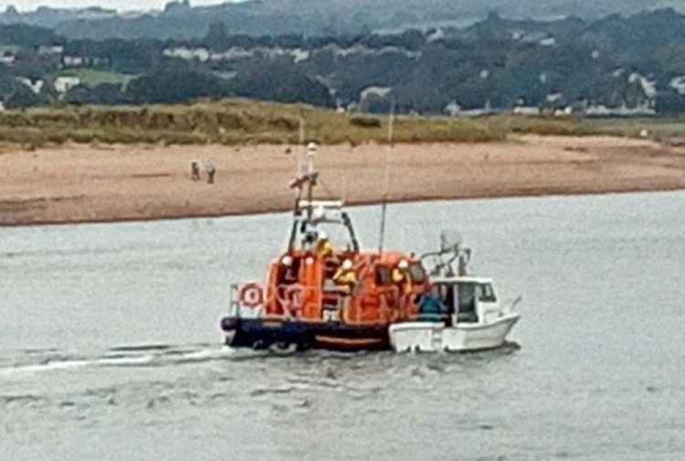 Exmouth Lifeboat with the casualty vessel. Image courtesy of John Thorogood/RNLI.