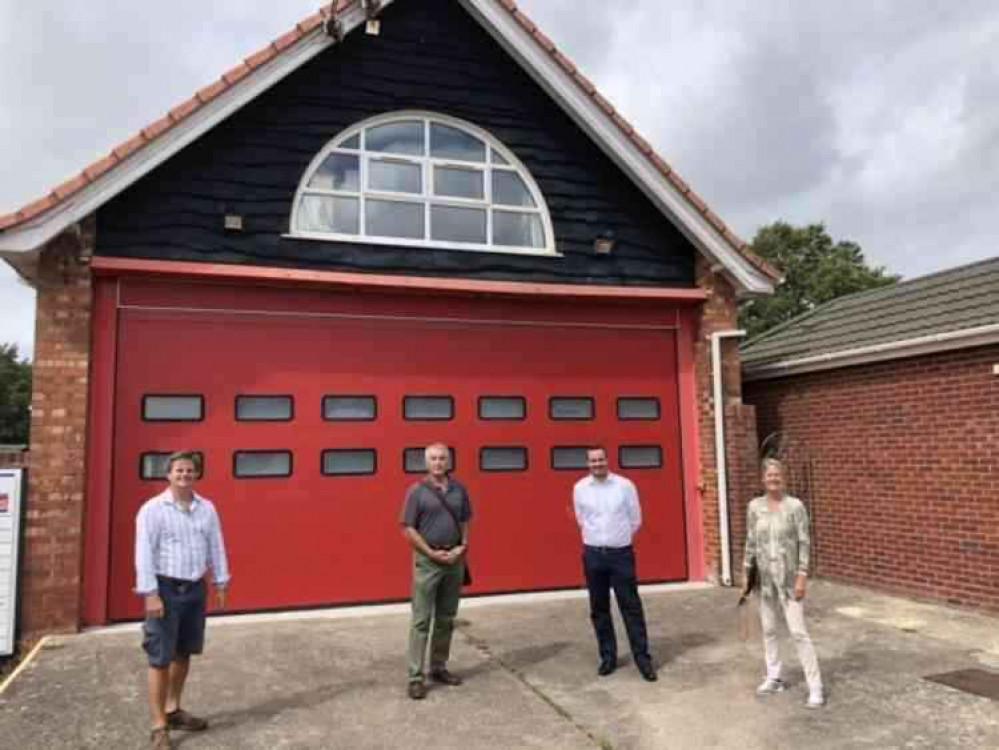 East Devon MP Simon Jupp with trustees of the Budleigh Community Workshop Trust. Image courtesy of the Budleigh Community Workshop Trust.