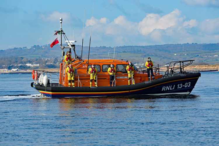 Exmouth RNLI Crew hold a minutes silence in memory of Tim on Sunday 11 April 2021. Credit : Neil Hurlock / RNLI