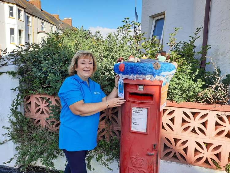 As many as 24 postboxes around the town now feature a knitted or crocheted 'topper' with a seaside theme. Credit: The Mail Trail