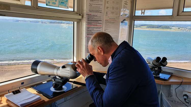 Phil Spencer using equipment inside Coastwatch House. Credit: NCI Exmouth