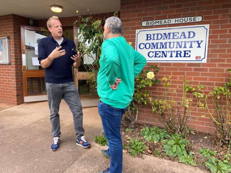 Rev Sam Burnett speaking with Cllr Bruce de Saram outside Bidmead Community Centre