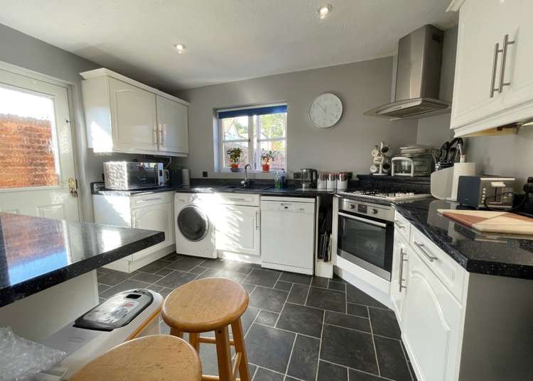 The spacious modern kitchen/breakfast room features a built-in gas hob and electric fan-assisted oven. Credit: Whitton and Laing