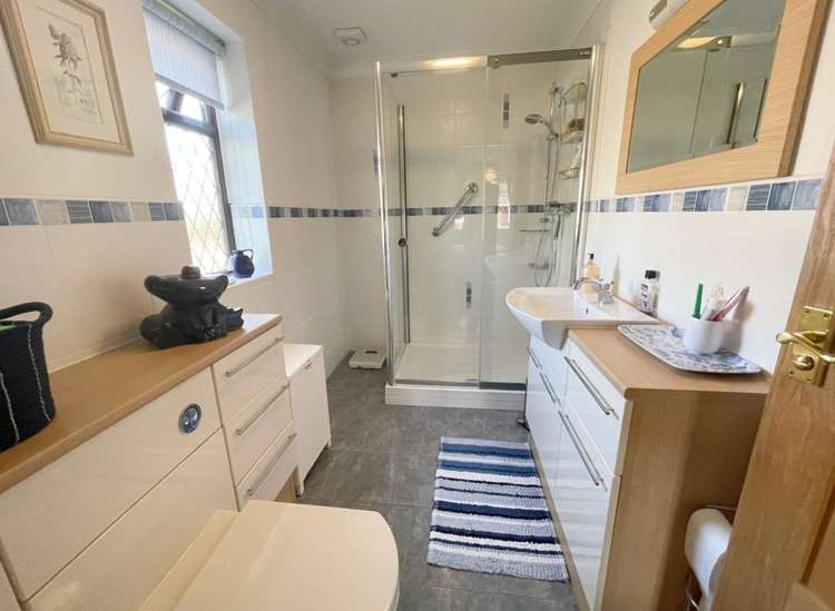 The master bedroom has its own en-suite shower room/WC, and there is another modern bathroom. Credit: Whitton & Laing