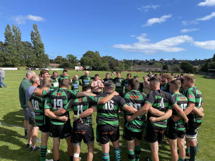 The team huddle after the game. Credit: Adam Curtis