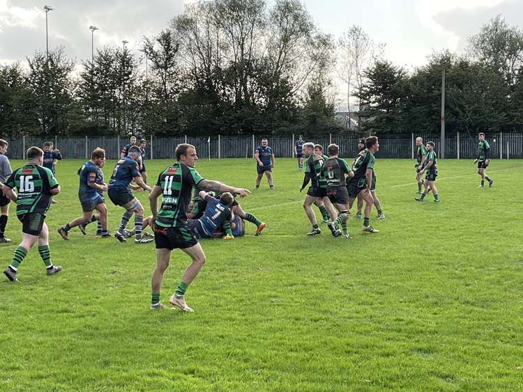 Action shot from Withycombe vs Topsham match. Credit: Adam Curtis