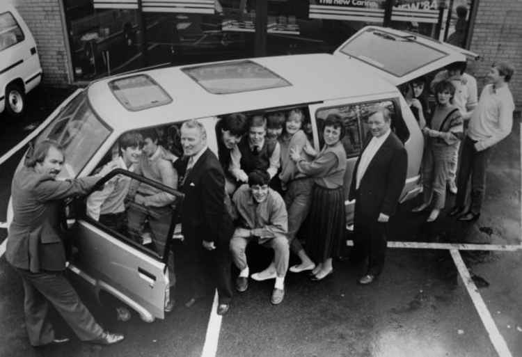 Swansway Group Chairman Michael Smyth pictured (right) in an old photograph with YTS trainees, training supervisor John Richmond (middle) and former director Bill Tildsley (far left)