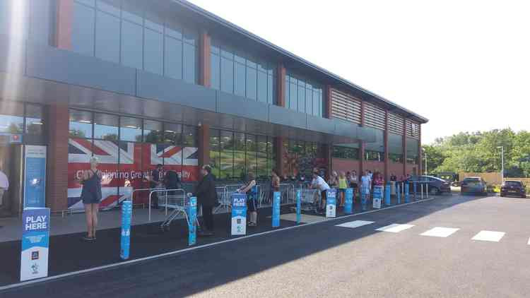 Customers formed a long socially-distanced queue at the new Aldi store in University Way