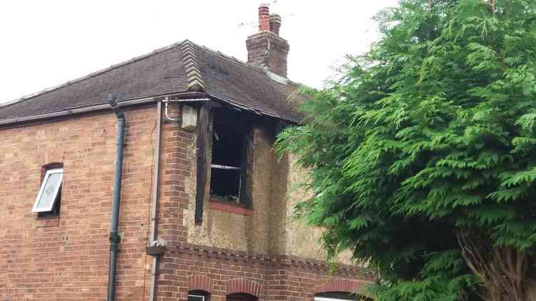 The fire gutted the bathroom at the home on Remer Street