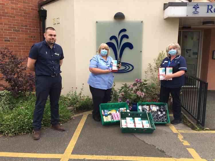 Anthony Lacking, operations manager Crewe Morrisons, with (centre) nursing assistant Andrea Ashley and sister Karen Jackson from St Luke's.