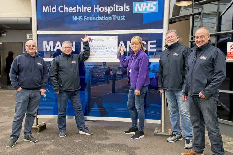 The Cat present Carole Salmon (middle) with the cheque; also (l to r) Neil Davis, Gary Johnson, Chris Cadman (The Cat's md) and Dave Foulkes.