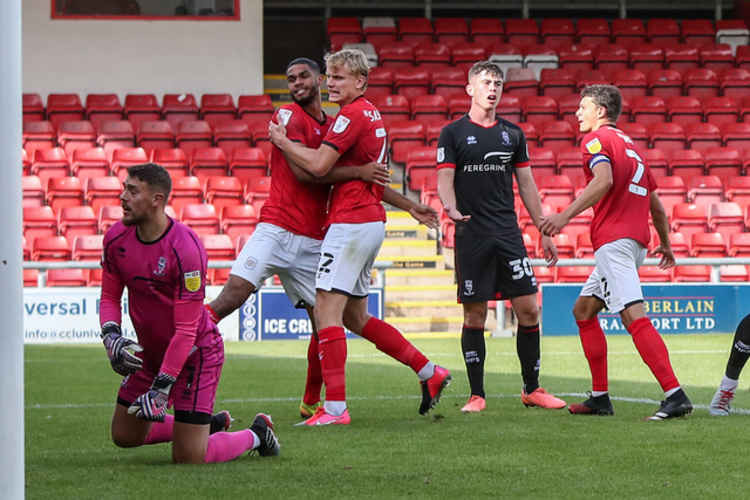 Celebrations after Sass-Davies' goal in last month's Caraboa Cup defeat against League One's leaders.