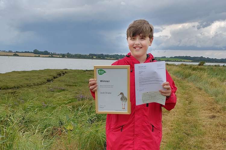 Joshua Drake with award from National Conservation Trust (Picture credit: Suffolk Wildlife Trust)