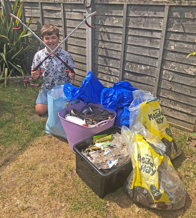 Josh with some of the plastic waste