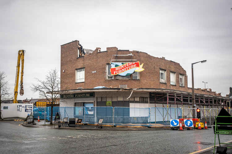 Shop frontage in Delamere Street on its way down.