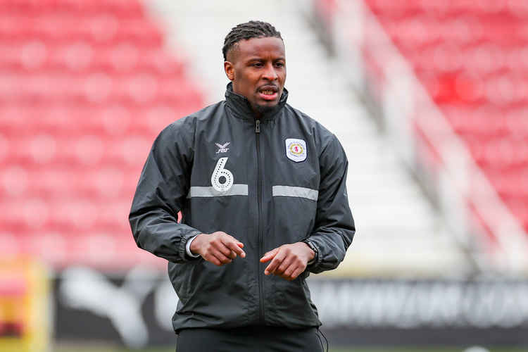 Donervon Daniels missed Crewe's defeat at Lincoln, where Rio Adebisi stood in at right-back.